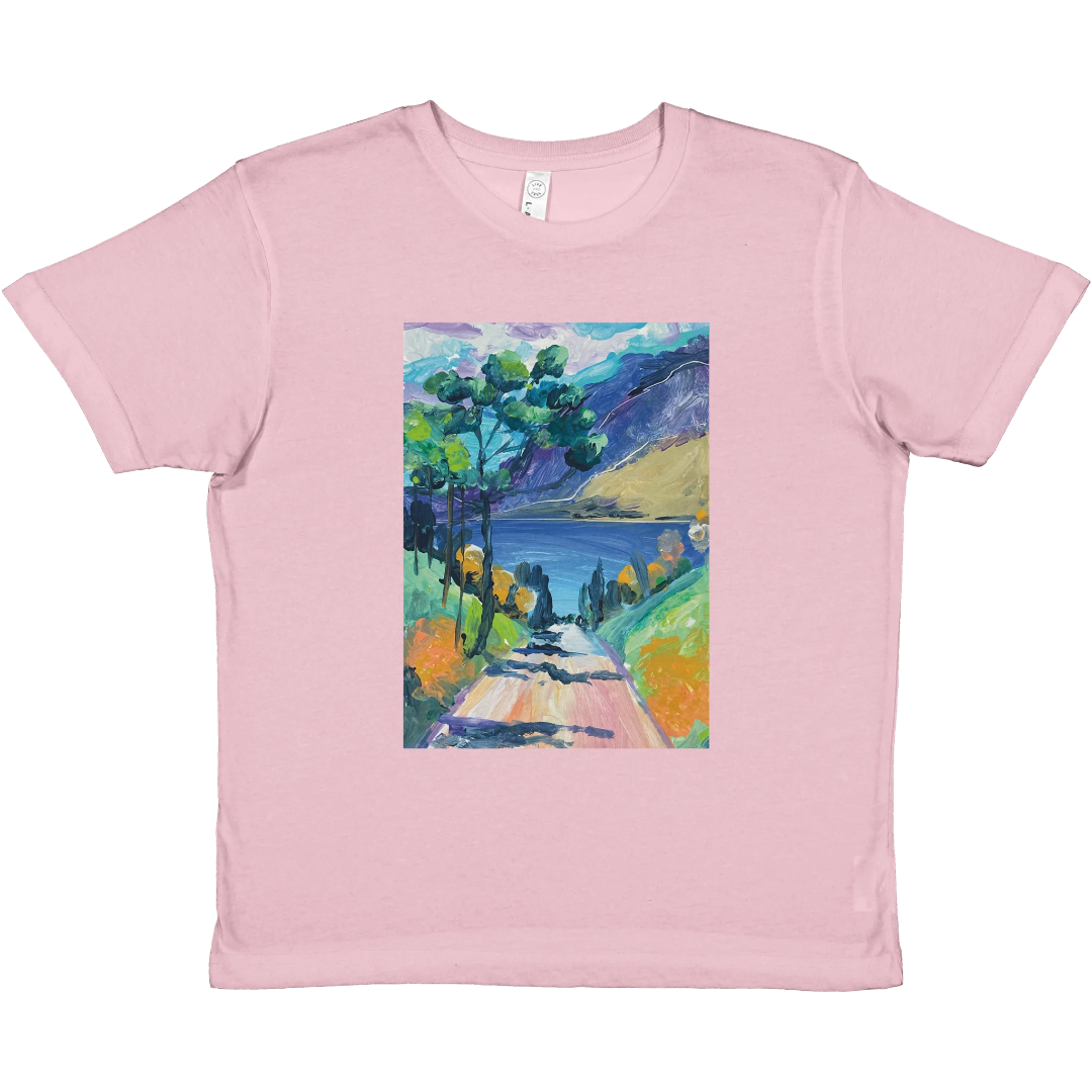 Pink t-shirt with a colorful landscape print on a white background